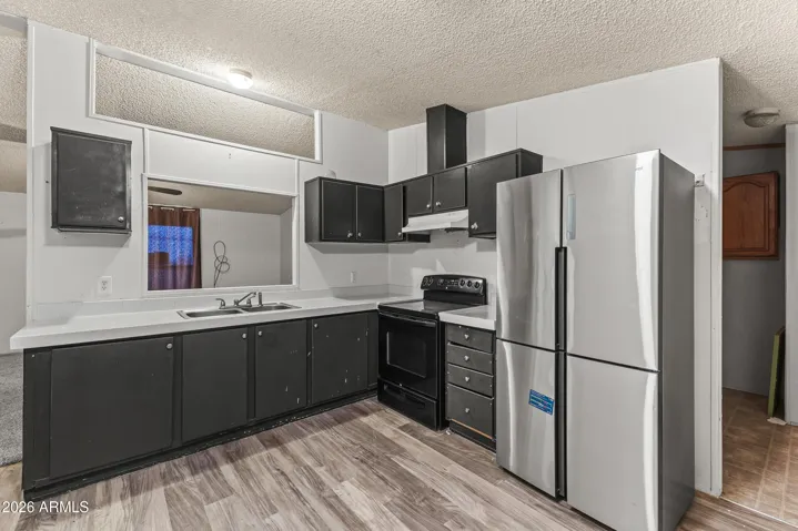 Flooring, counters and cabinets have all been updated.