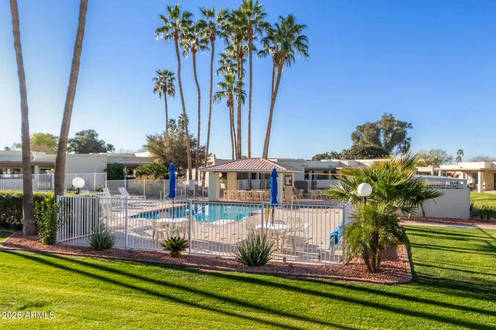 JUST STEPS TO THE BEAUTIFUL COMMUNITY POOL