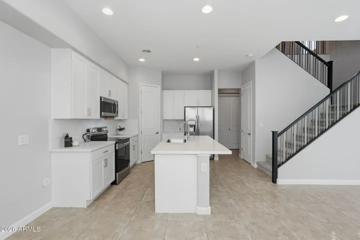 Featuring new cabinets and quartz counter tops.