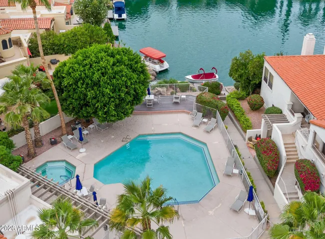 Take a dip in the pool or soak in the spa overlooking beautiful Lake Serena