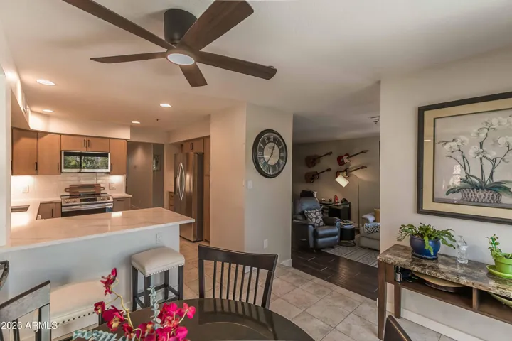 Open to the kitchen so you don't miss the action!