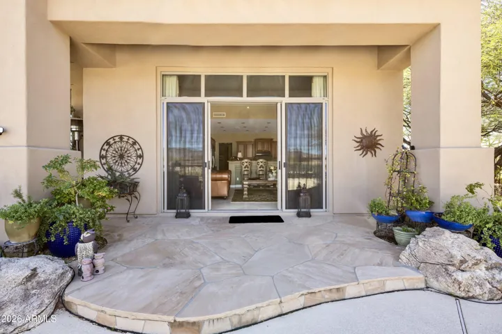 Enter the backyard oasis from the Family Room.