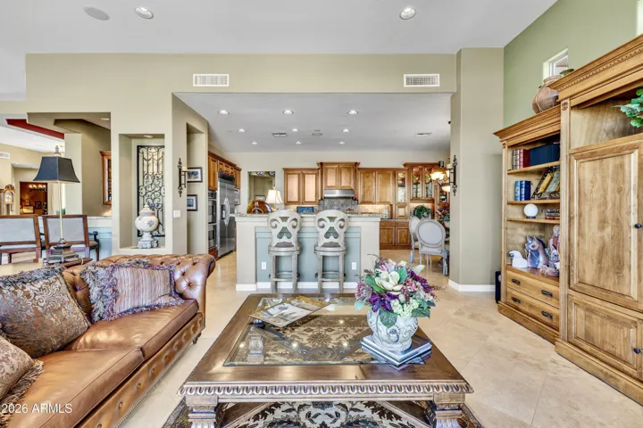 Family room open to gourmet kitchen & to entertaining backyard.
