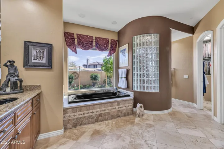 Roomy, spa-like primary bath.