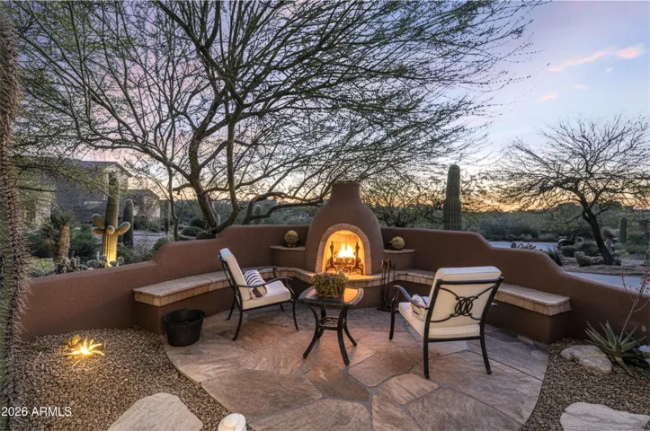 Cozy up to the warm fireplace to enjoy the sunset.