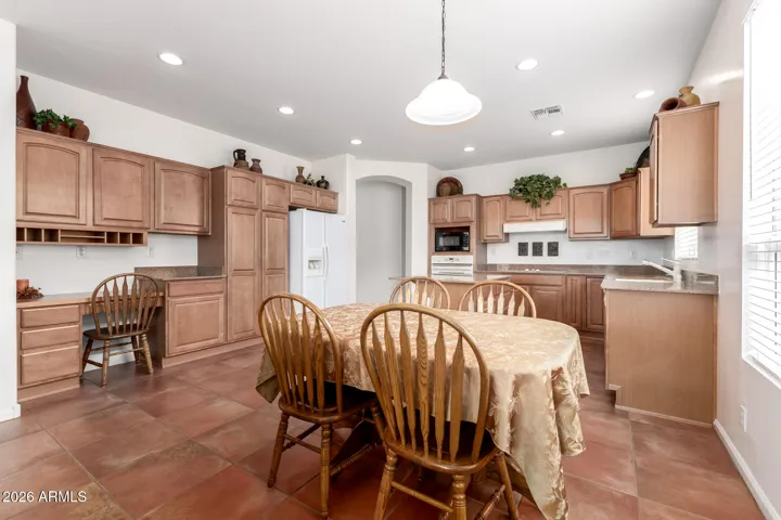built-in desk area and plenty of cabinets