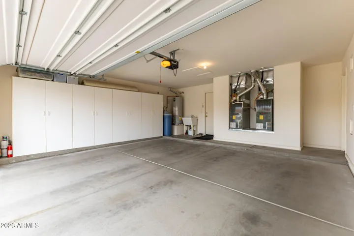 garage with built-in storage cabinets