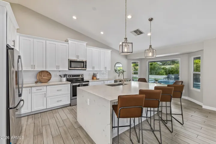The waterfall quartz island fits perfectly with the flow of the kitchen