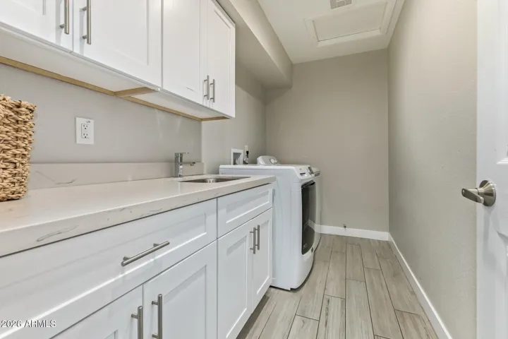 Throw everything in the laundry room, shut the door, then allow people over.