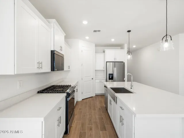 Photo is not of the actual home. Interior finishes and fixtures may vary