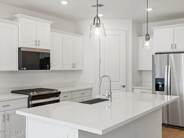 Photo is not of the actual home. Interior finishes and fixtures may vary