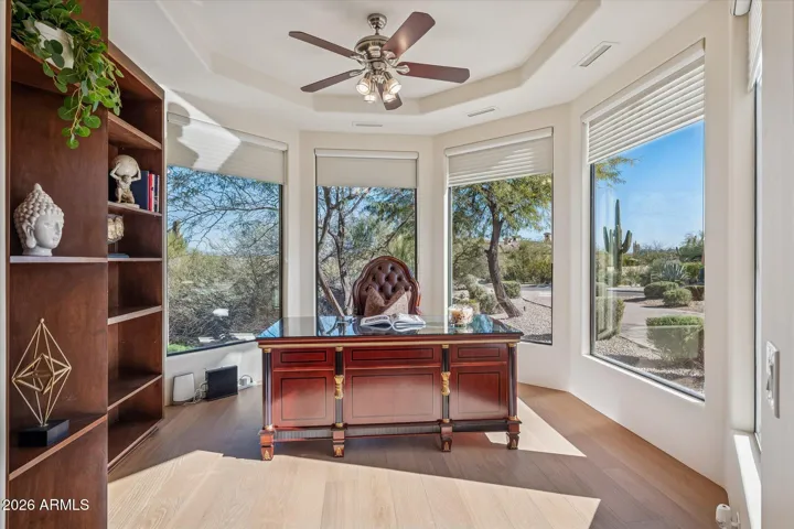 Located near the entrance and currently set up as an office, but has closet and en-suite bathroom