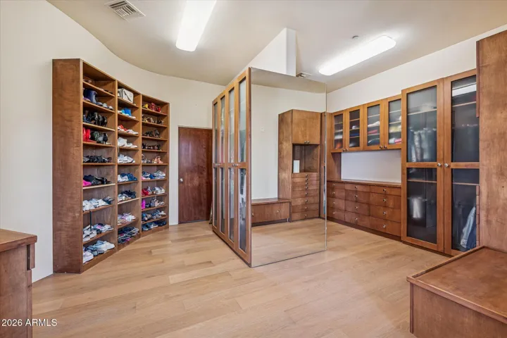 Spacious walk in with stacked Washer/Dryer
