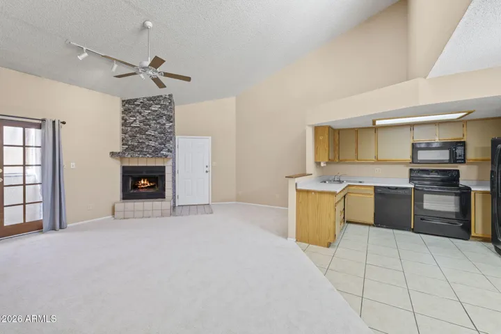 Great room flowing into the kitchen and dining area.