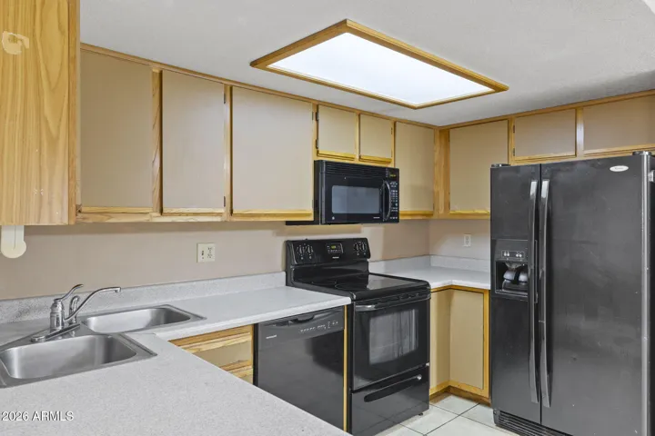 Kitchen with ample storage and appliance package.