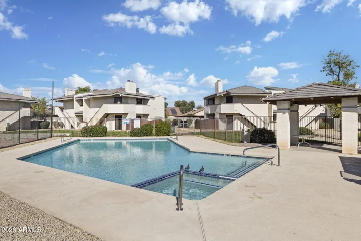 Large community pool for relaxing and cooling off.