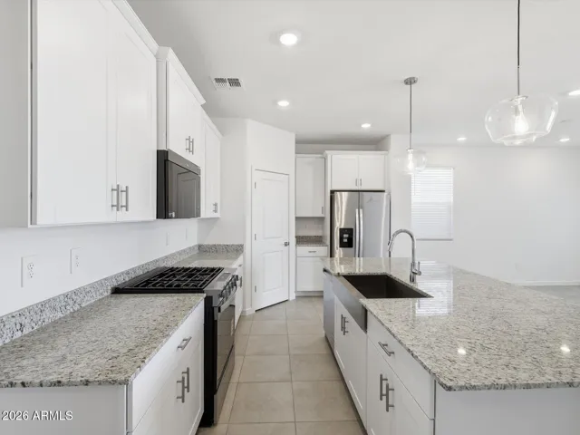 Photo is not of the actual home. Interior finishes and fixtures may vary.