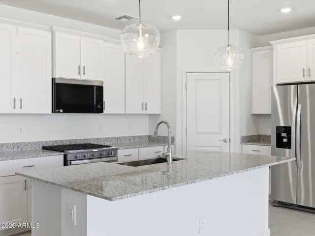 Photo is not of the actual home. Interior finishes and fixtures may vary.