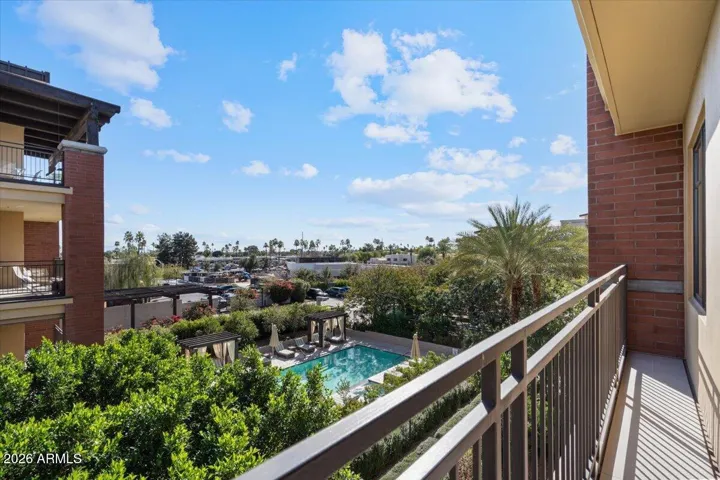 Balcony view overlooking the pool.