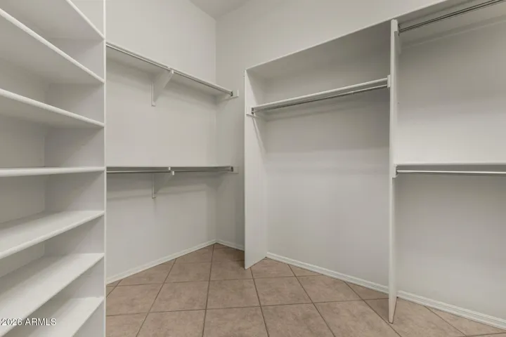 Primary closet is enormous & shows as natural light with light-tube installed
