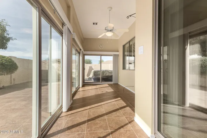 Sunroom built at original build with Farnsworth has (3) sets of arcadia doors to backyard patio