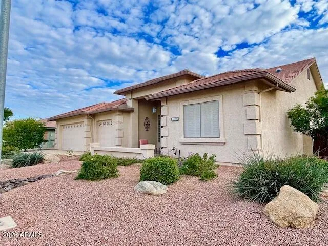 Welcome home to Sunland Springs Village on this quiet corner lot on Neville!