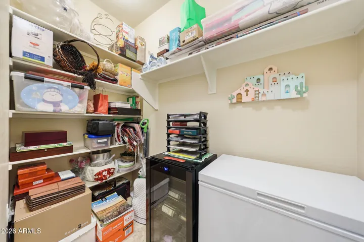 Great hideaway room for chest freezer and wine cooler which both stay