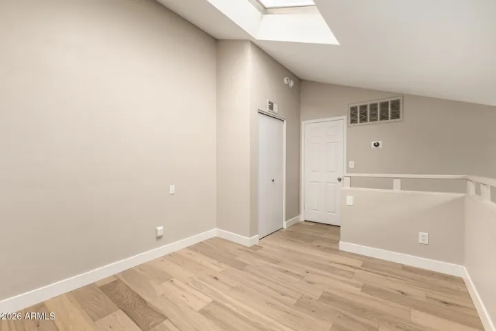 This great space is flooded with natural light from skylight above it. Perfect for a reading nook, office or additional living/play area.
