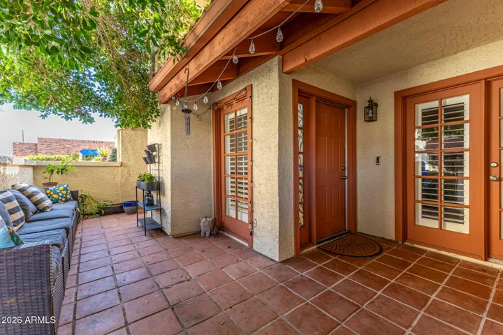 Welcome home to your stunning courtyard, complete with plush tree and strung lights. The perfect place for morning coffee or evening beverage.