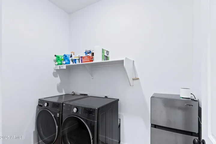 Large laundry with nook for freezer, etc!