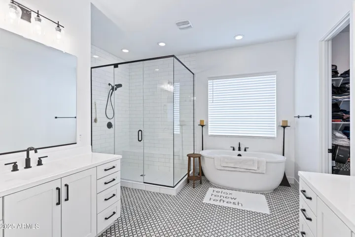 Soaking tub, walk in shower, modern floors!!