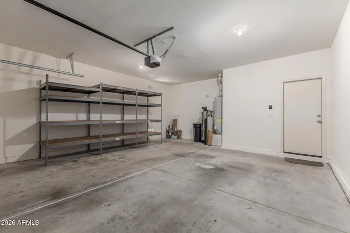 Garage with shelving, water softener