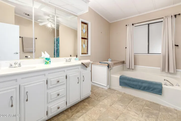 Dual Sinks and Soaking Tub in Master Bathroom