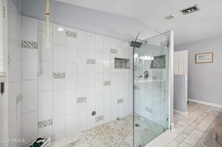 Natural stone oversized shower in owner's bath!