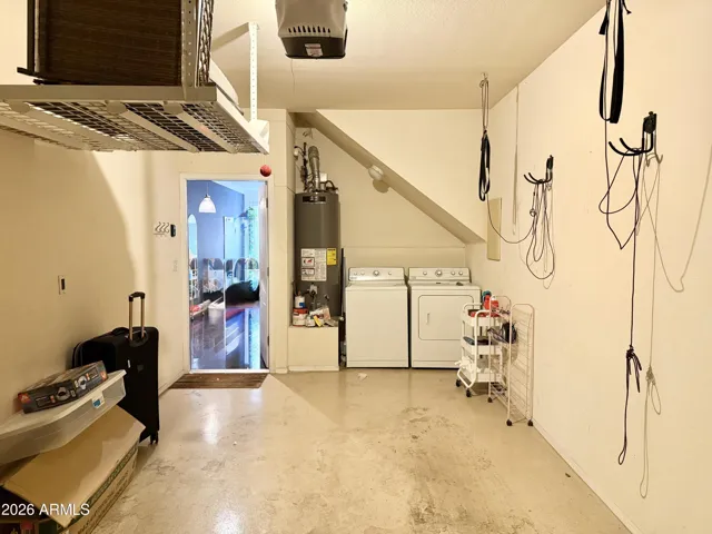 One car garage with laundry area