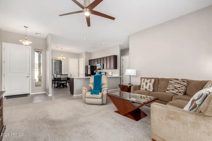 FRONT DOOR ENTRY TO THE LIVING ROOM AND KITCHEN AREA.