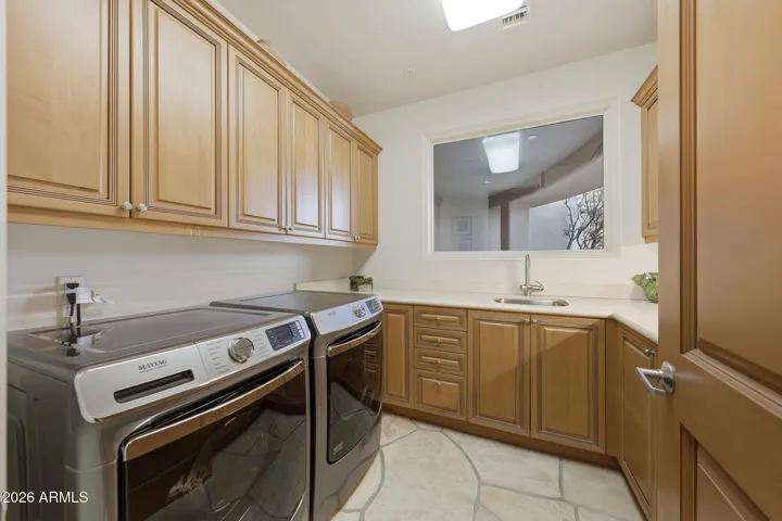 Complete with granite counters, sink and ample cabinetry and a new washer and dryer
