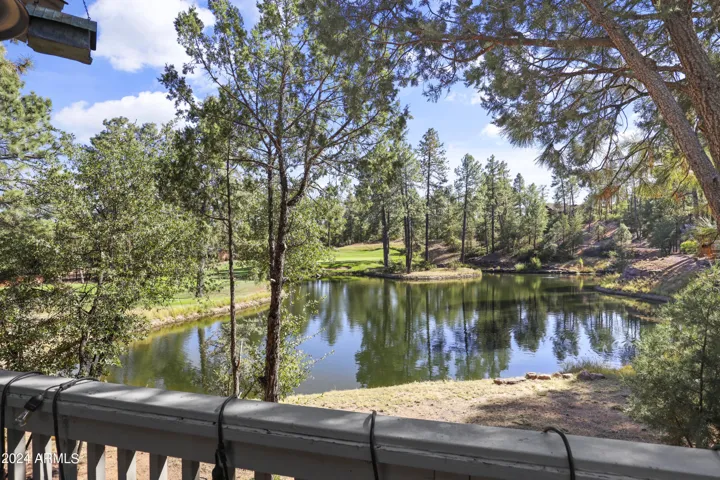 Beautiful views of hole 10 and the signature Chaparral Pines golf course lake.