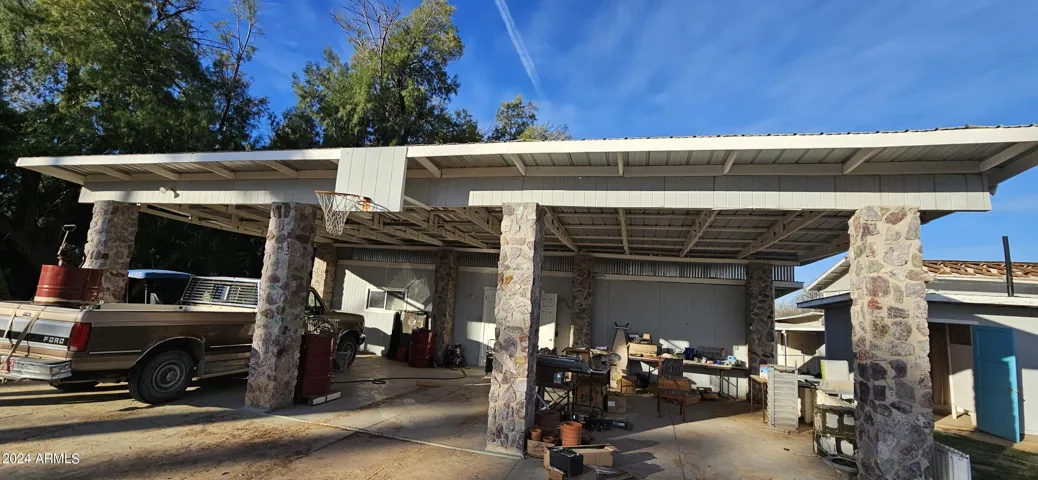 Multiple garage / storage / carport structures.
