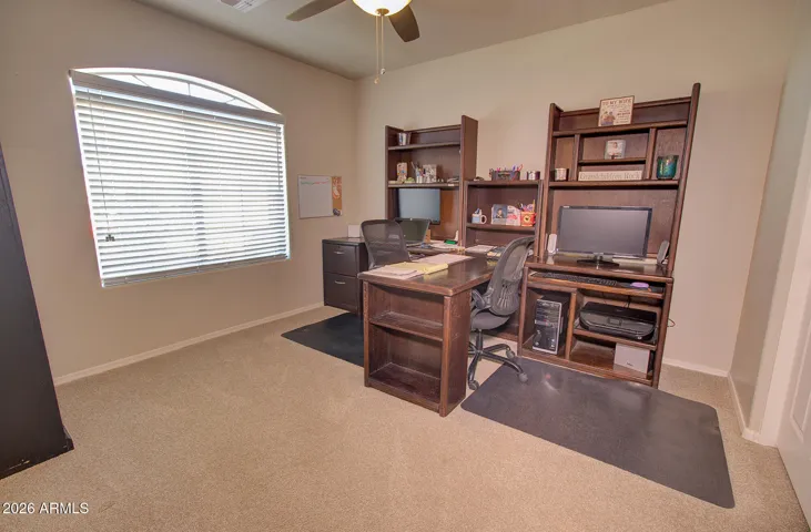 Bedroom 3 shown as an office. Paint shown darker than is, see great room pics