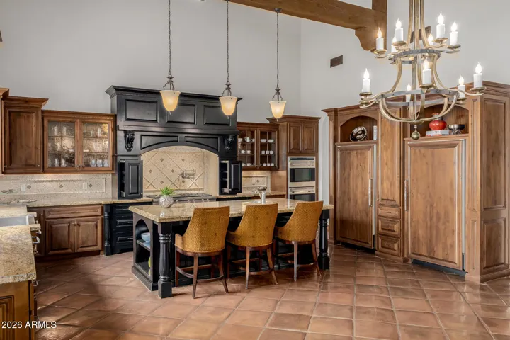 High End Cabinets Offer Ample Storage. Granite Counter, Custom Backsplash and Pendant Lights. Upgrades Galore!