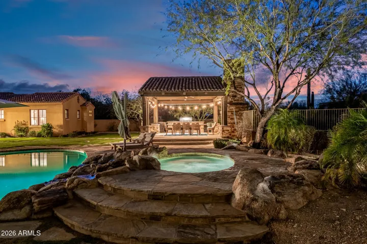 Rocks & Water Fall Creates an Outdoor Spa Like Feel!