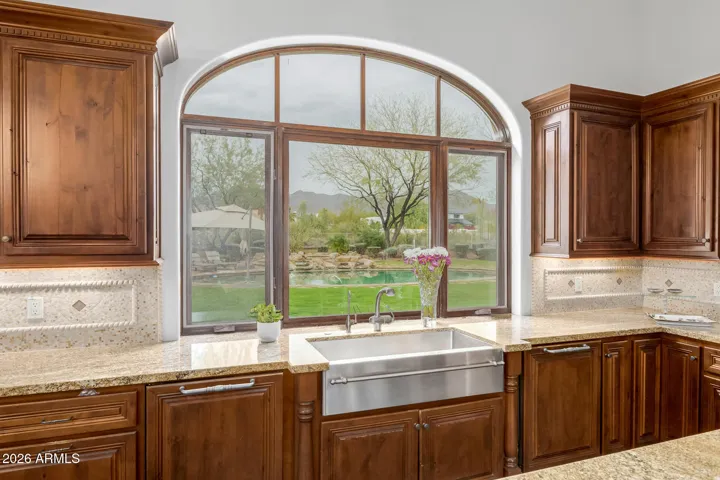 Bright & Airy Kitchen - Large Window Brings in Natural Light & Outdoor views.