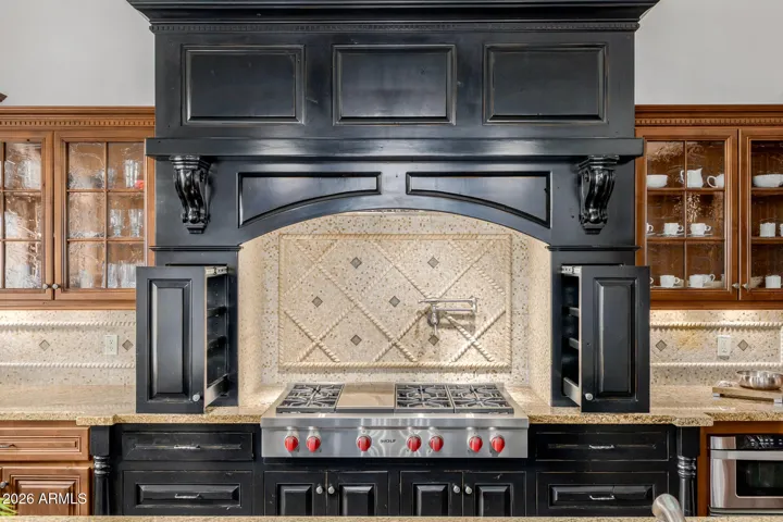 Red Knobs! Decorative Backsplash with Water Tap and Double Oven on the Side!