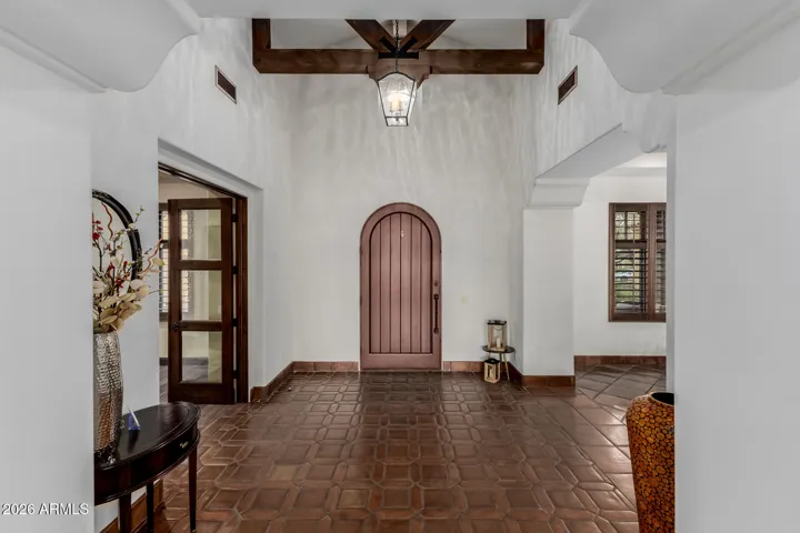 Step Inside: Formal Dining and Office Rooms on either side of the Foyer.
