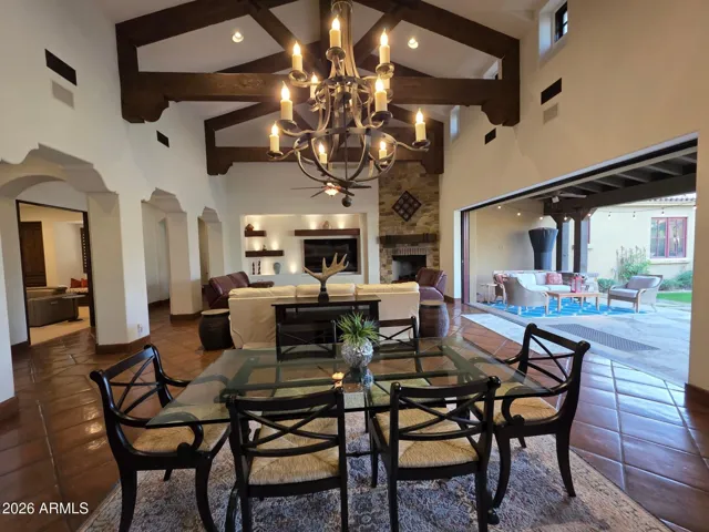 Dining Space with Large Chandelier for Cozy Meals!