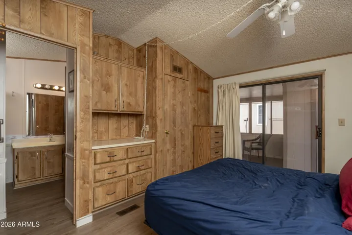 Bedroom with built in closet and dresser
