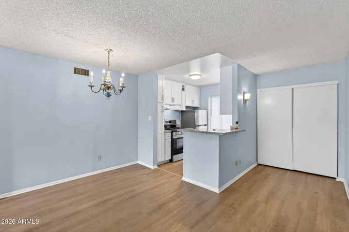 View of dining area into the kitchen