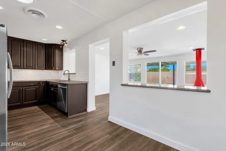 Dining room overlooking kitchen and bonus room