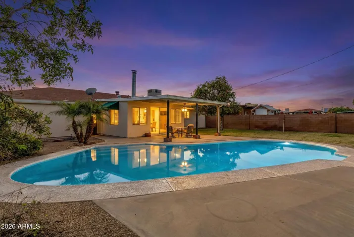 Relax by this peaceful pool and watch the sunset